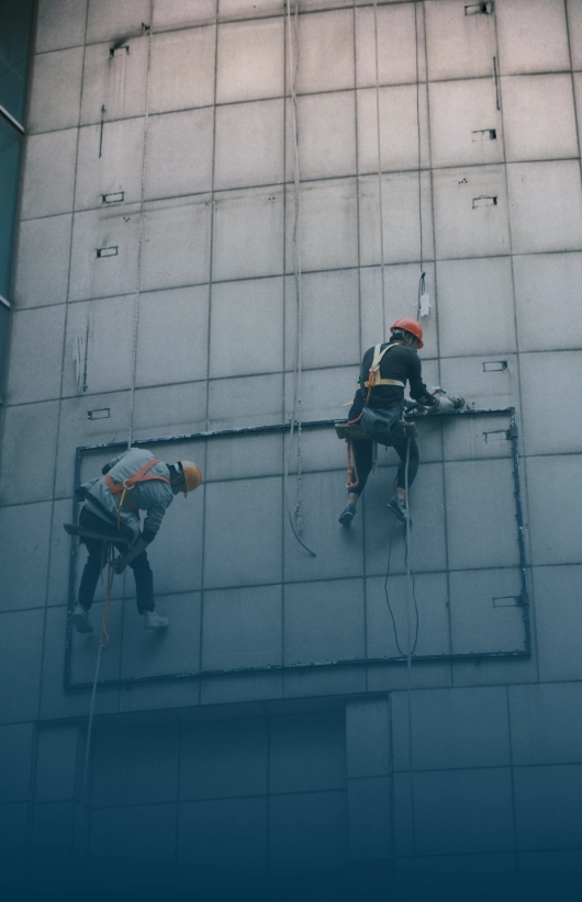 worker working on wall branding